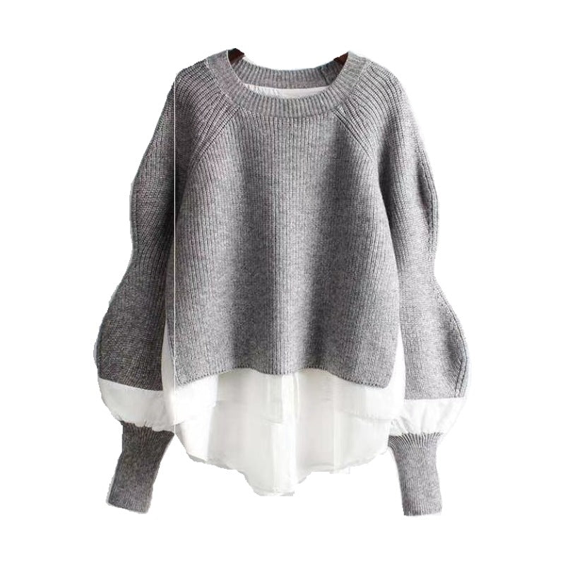 Gray sweater with white trim on a white background